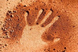 mano forma su sabbia piace aborigeno arte stile foto