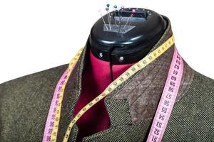 sartoria di maschio verde tweed giacca su indossatrice foto