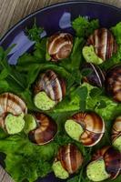 escargot su il piatto foto