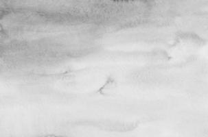 acquerello leggero grigio e bianca strutturato sfondo. monocromatico macchie su carta. moderno astratto morbido la pittura. foto