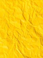 verticale sfondo a partire dal giallo spiegazzato carta foto