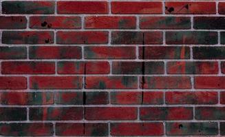 muro di mattoni rossi foto
