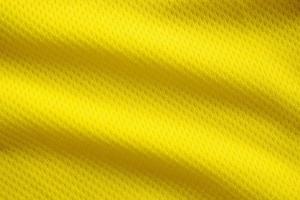 colore giallo maglia da calcio abbigliamento tessuto trama abbigliamento sportivo sfondo, primo piano foto