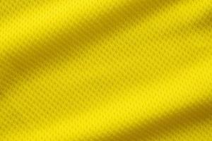 colore giallo maglia da calcio abbigliamento tessuto trama abbigliamento sportivo sfondo, primo piano foto