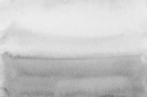 acquerello leggero grigio sfondo struttura. bianca e grigio sfondo. grigio macchie su carta sovrapposizione, mano dipinto. foto