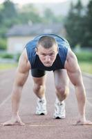 giovane atleta su inizio foto