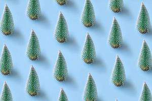 verde Natale albero modello minimo flatlay su blu pastello sfondo nuovo anno vacanza celebrazione concetto foto