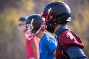 americano calcio squadra con allenatore nel azione foto