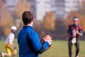 americano calcio squadra con allenatore nel azione foto