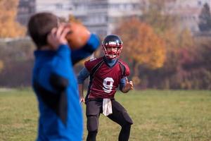 americano calcio squadra con allenatore nel azione foto