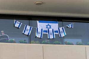il blu e bianca bandiera di Israele con il a sei punte stella di davide. foto