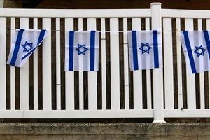 il blu e bianca bandiera di Israele con il a sei punte stella di davide. foto