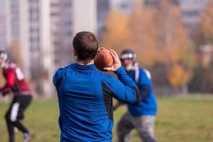 americano calcio squadra con allenatore nel azione foto