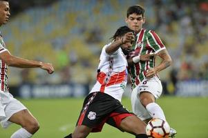 rio, brasile - aprile 11, 2018 - Harold reina e ayrton lucas giocatore nel incontro fra fluminese e nacional potossi di il sulamerica campionato nel maracana stadio foto