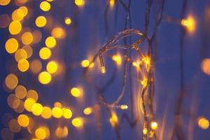 astratto d'oro bokeh leggero Natale vacanza sfondo foto