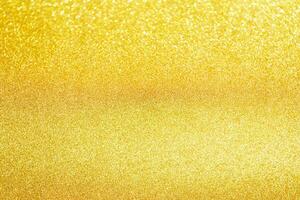 astratto oro luccichio scintillare con bokeh leggero sfondo foto