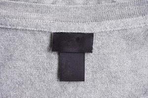 vuoto nero lavanderia cura capi di abbigliamento etichetta su tessuto struttura foto