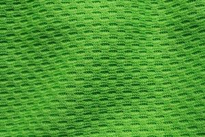 verde gli sport capi di abbigliamento tessuto calcio camicia maglia struttura vicino su foto