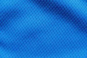 blu gli sport capi di abbigliamento tessuto calcio camicia maglia struttura vicino su foto