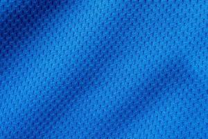 blu gli sport capi di abbigliamento tessuto calcio camicia maglia struttura vicino su foto