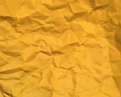 astratto struttura di giallo rugosa carta sfondo per design. copia spazio per testo o opera foto