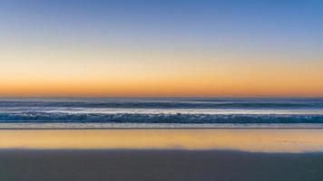 surfers Paradiso spiaggia a tramonto foto
