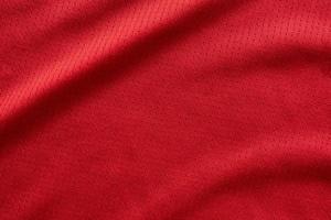 gli sport capi di abbigliamento tessuto calcio maglia struttura superiore Visualizza rosso colore foto