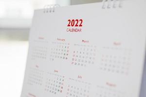 vicino su 2022 calendario pagina date e mese sfondo attività commerciale pianificazione appuntamento incontro concetto foto