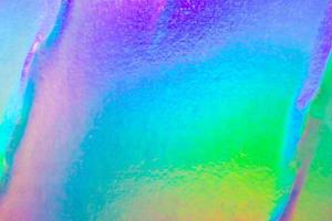 spiegazzato olografico arcobaleno Foglio iridescente struttura astratto ologramma sfondo foto