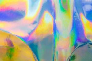 olografico arcobaleno Foglio iridescente struttura astratto ologramma sfondo foto