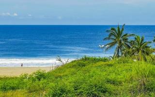 estremamente naturale panorama surfer onde a spiaggia puerto escondido Messico. foto