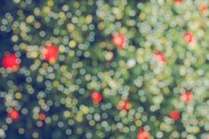 astratto sfocato Natale albero con bokeh leggero sfondo foto