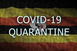 Uganda bandiera e covid-19 quarantena iscrizione. coronavirus o 2019-ncov virus foto