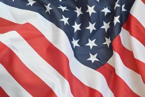 unito stati di America agitando bandiera con molti pieghe foto