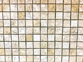 il struttura di il piccolo piazza ceramica Marrone decorativo piastrelle, mosaici con cuciture per il bagno, cucina. il sfondo foto