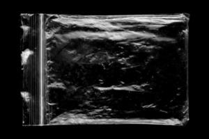 vuoto trasparente plastica Borsa copertura su nero sfondo foto