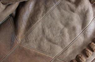 sfondo Immagine di morbido pelle scamosciata beige tappeto. condimento pecora lana avvicinamento struttura sfondo. superiore Visualizza. foto