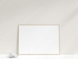 interno manifesto modello con foto telaio pendente contro il bianca parete. minimalista foto telaio modello. vuoto telaio sta su bianca tavolo. 3d resa.