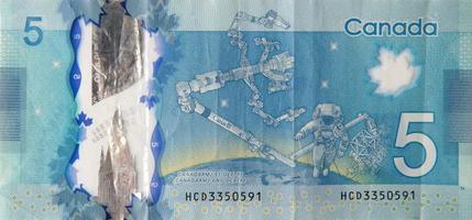 destro e canadarm2 su Canada 5 dollari 2013 polimero banconota frammento foto