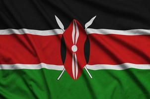 Kenia bandiera è raffigurato su un' gli sport stoffa tessuto con molti pieghe. sport squadra bandiera foto