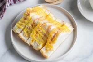 flossy Maiale Sandwich con insalata condimento foto
