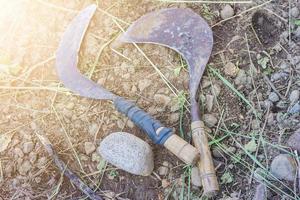 un' agricoltori attrezzo chiamato un' cengkrong falce foto