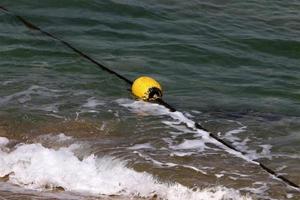 canapa corda con boe su il città spiaggia foto