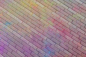 Multi colorato pavimentazione lastre, polvere rivestito con asciutto colori a il holi Festival foto