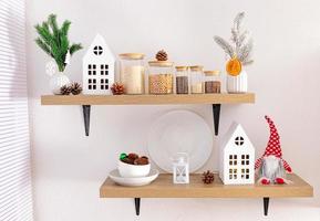 davanti Visualizza di Aperto cucina scaffali con eco barattoli per massa prodotti e Natale decorazioni. cartone bianca case, naturale coni. foto