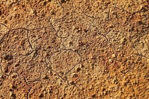 asciutto inquinata arancia pietroso suolo, superiore Visualizza. foto