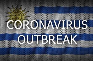 Uruguay bandiera e coronavirus scoppio iscrizione. covid-19 o 2019-ncov virus foto