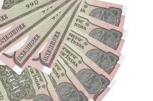 1 indiano rupia fatture bugie isolato su bianca sfondo con copia spazio impilati nel fan forma vicino su foto