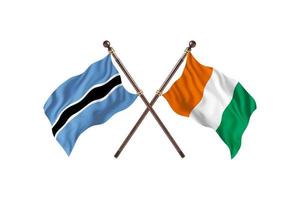 Botswana contro riparo d'Avorio Due nazione bandiere foto