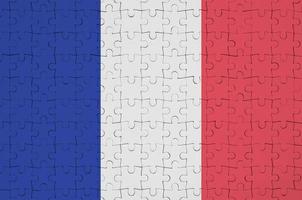 Francia bandiera è raffigurato su un' piegato puzzle foto